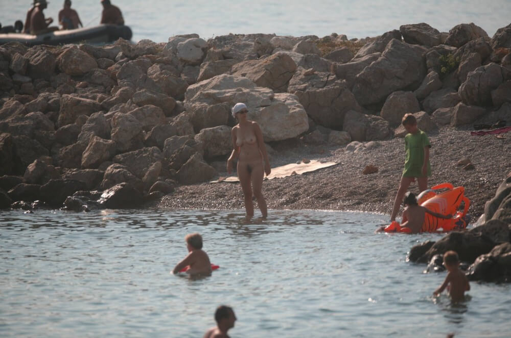 FKK cove pyramid in waters - Nudity helps you understand yourself and the people around you better