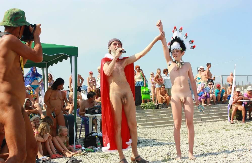 Native Headdress Dance pics - Love for oneself and the environment are important values in naturism and nudism