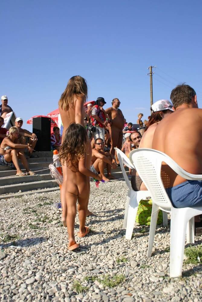 Naturist Standing Sideline - It is a path to inner freedom, achieved through acceptance and openness without clothing