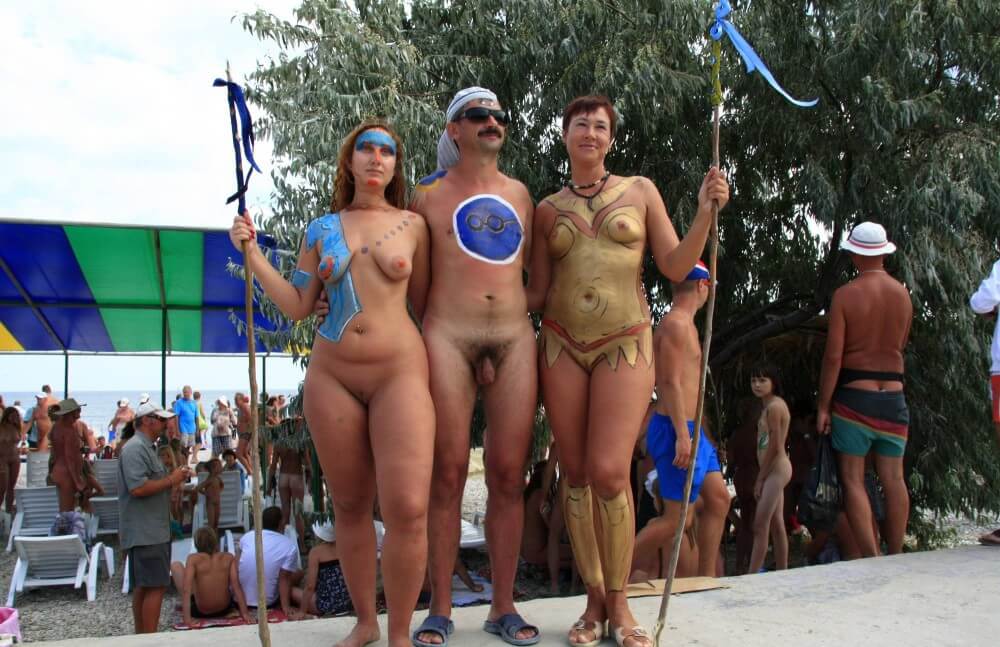 Three Painted Girl Poses pics - Respect for one another and for the natural world are key principles of nudism and naturism