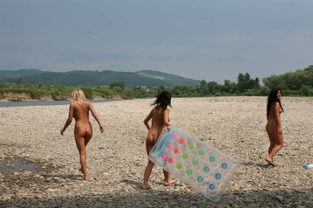 Naturist Park Floating On River photos - The naked body is an expression of freedom