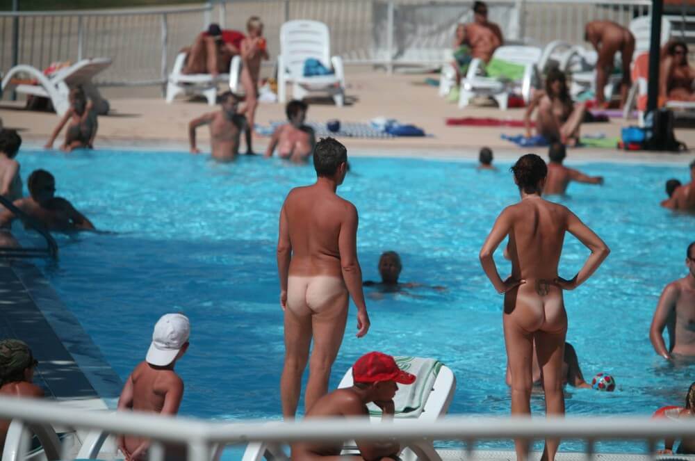 Pool-Shore Group Exercise - In naturism, nature serves as the bodys natural clothing