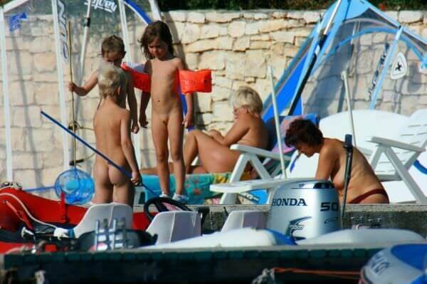 By the boat photos - Simplicity and naturalness are valued in nudism