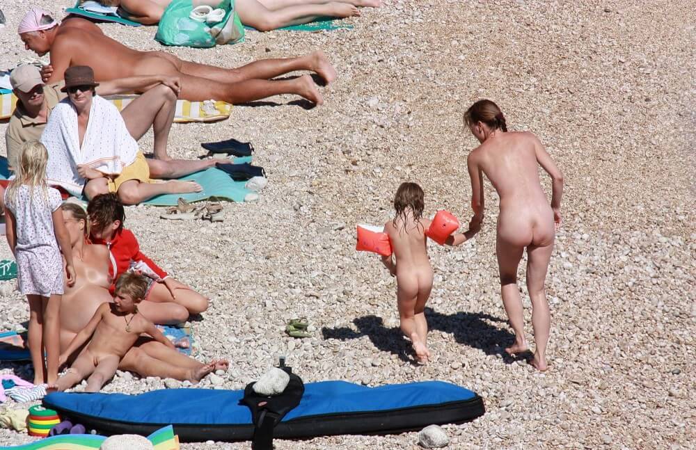 Orange Floaty Safety First Naturist pics - Naturism promotes honesty and an open connection with the body